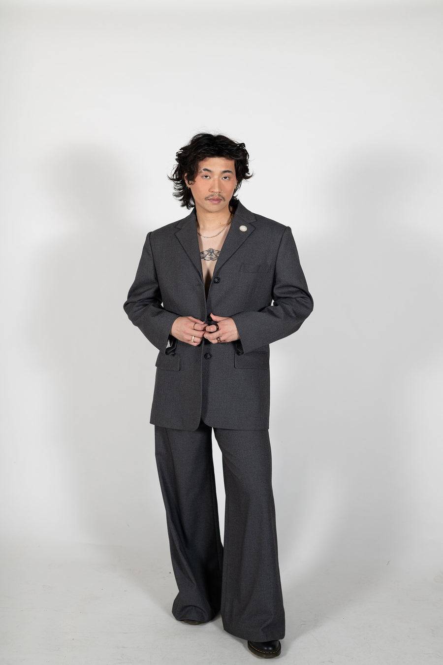 Jake wears the Acme Grey Tailored Suit Set by House of Campbell.