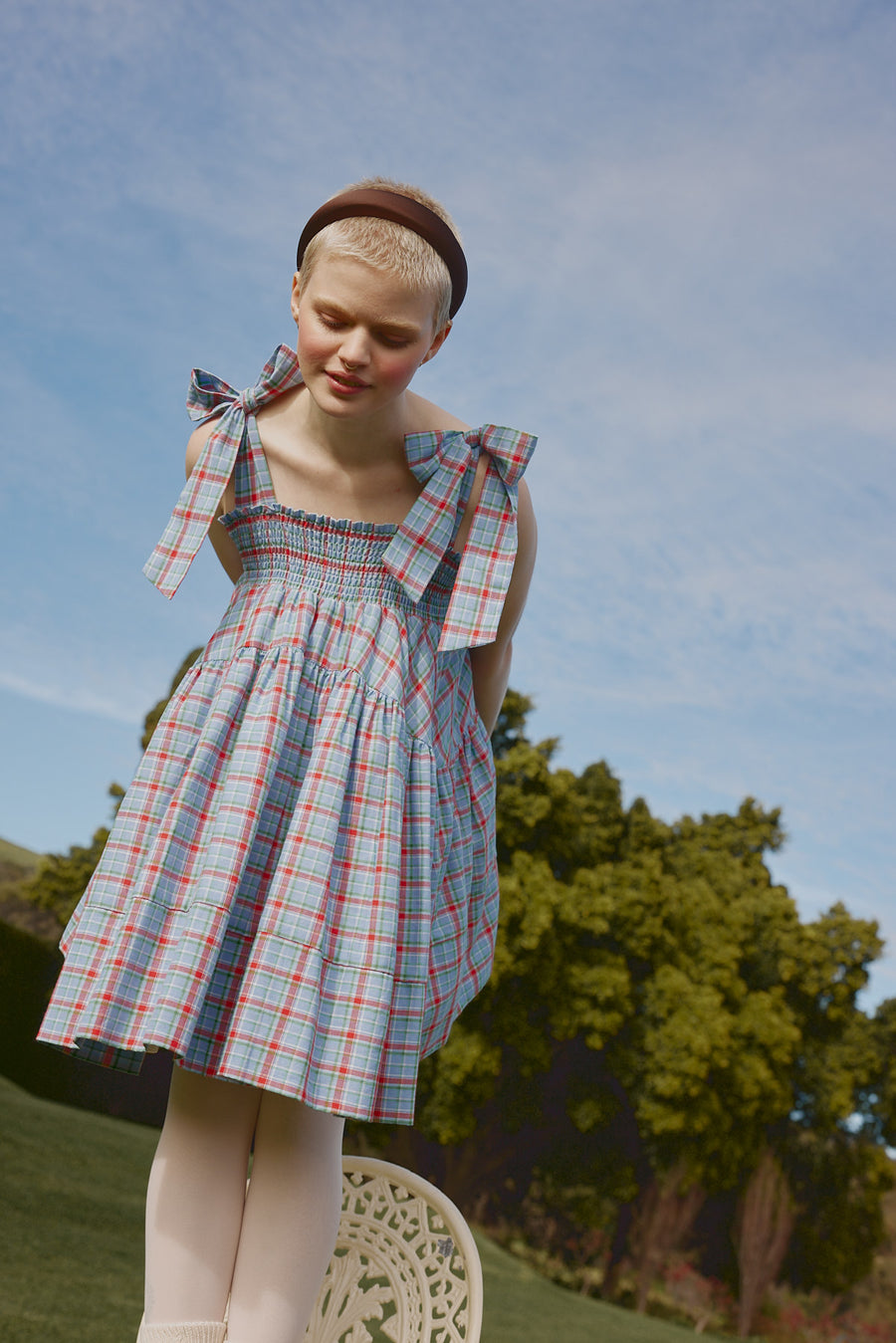 In Perpetuity campaign featuring the Mirabel dress in cornflower blue plaid by House of Campbell