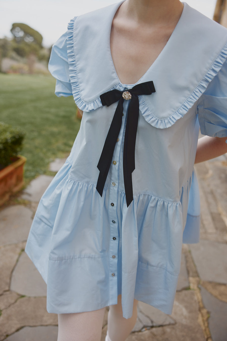 Ruffle Peter Pan collar on the Hazel Mini Dress in blue cotton shirting by House of Campbell.
