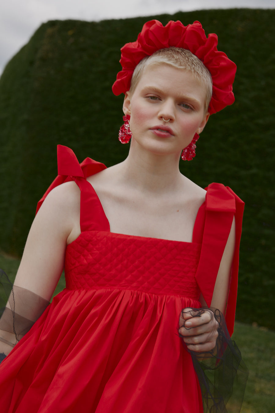 Quilted bodice details of the Dolly Mini Dress in Poppy Red by House of Campbell.