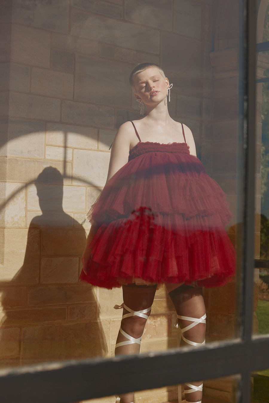 Smock pleating details of the Signature Maurice Tulle Mini Dress in carnelian red by House of Campbell Australia.