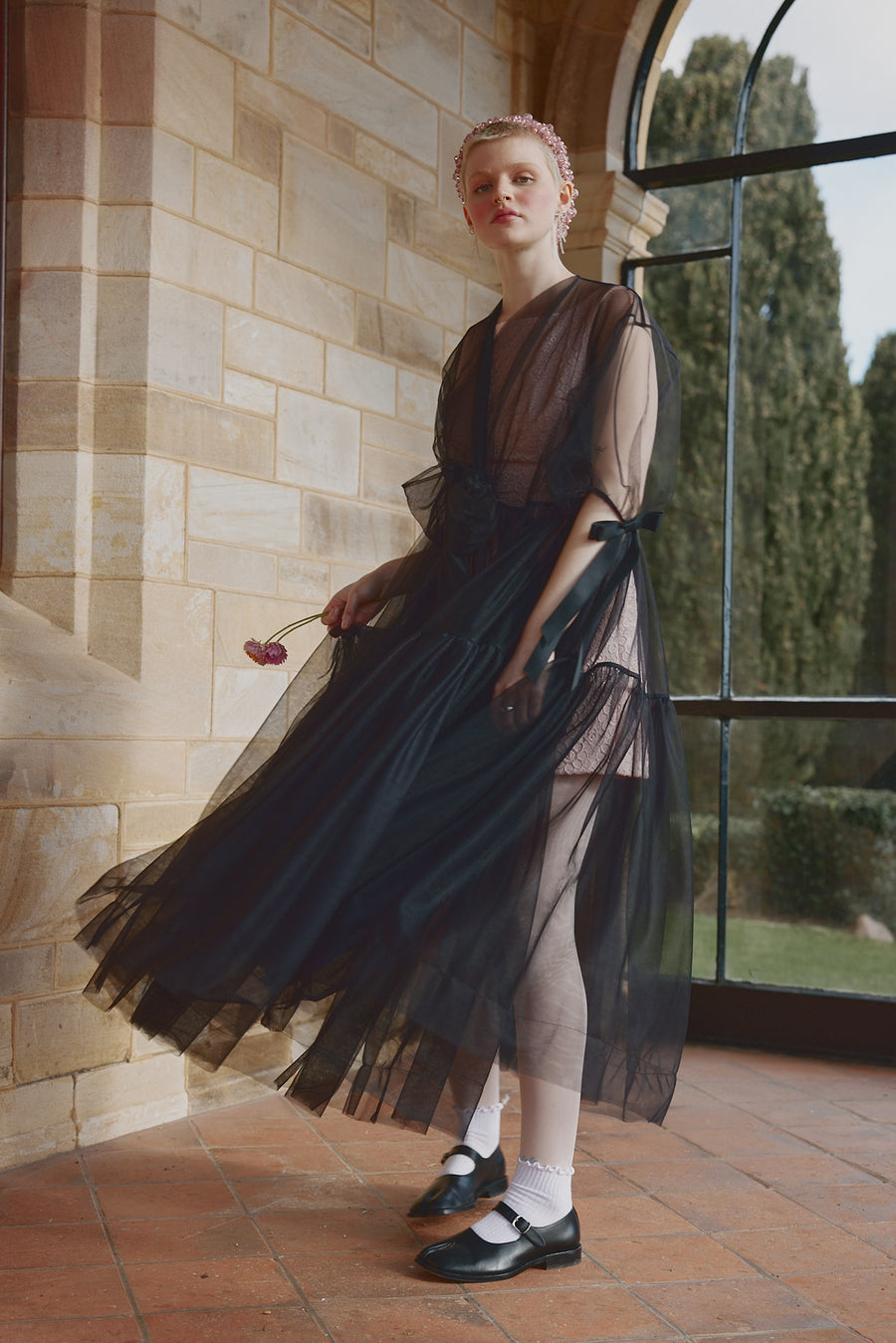 Swishing tulle of the Reverie Midi Dress by Australian designer brand House of Campbell.