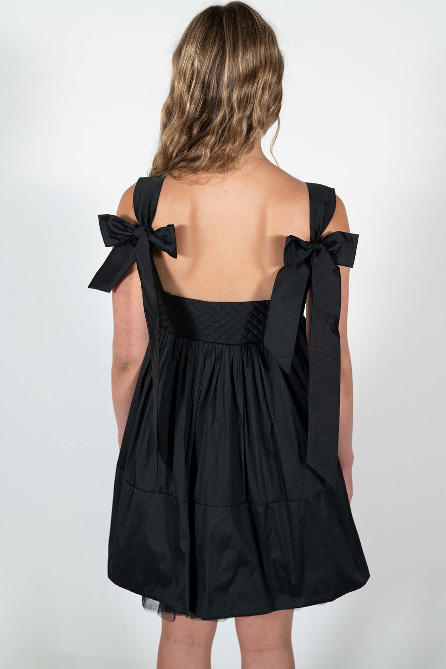 The Dolly Mini Dress with black taffeta bows and netting underskirt by House of Campbell.