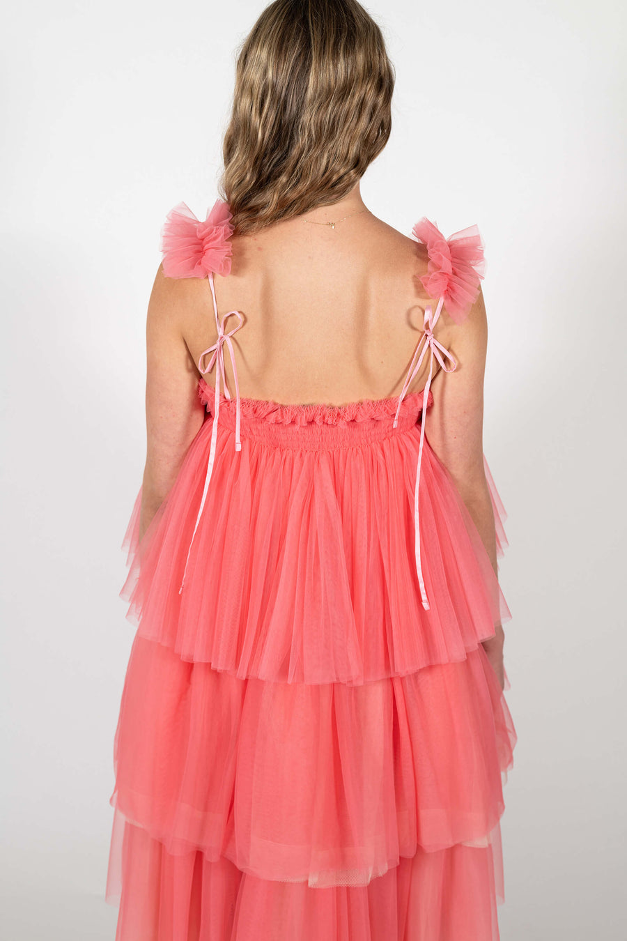 Close up back details of the tulle shoulder straps with bow ties on the Mariposa Tulle Midi Dress by House of Campbell.