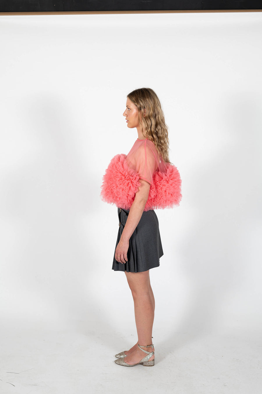 Side view of the pink sorbet Camille Top.