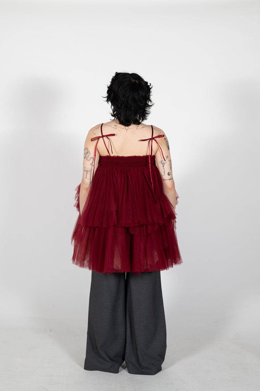 Back view of bow straps on Maurice tulle mini dress by House of Campbell.