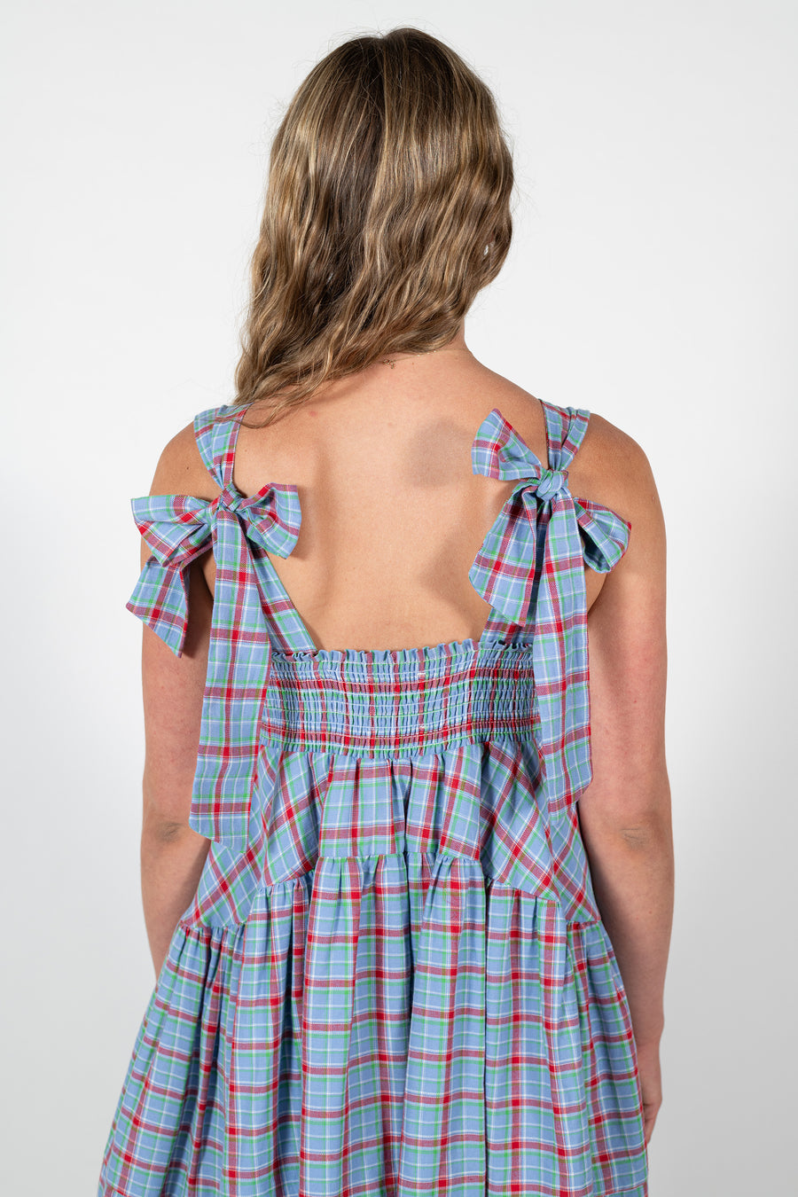 The Mirabel Dress in cornflower blue plaid featuring self tie bow straps by House of Campbell